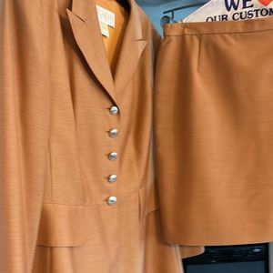 Beautiful detail on this ESCADA fully lined suit- jacket and skirt.